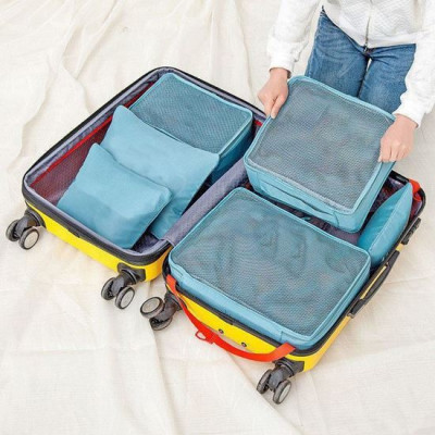 Zestaw organizerów podróżnych w walizce - niebieski